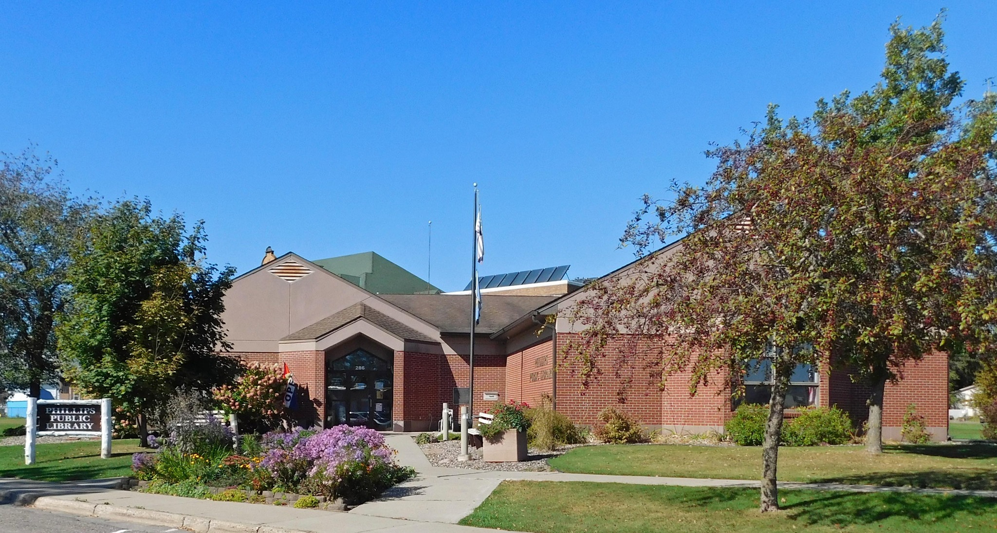 Photo of library building in spring time